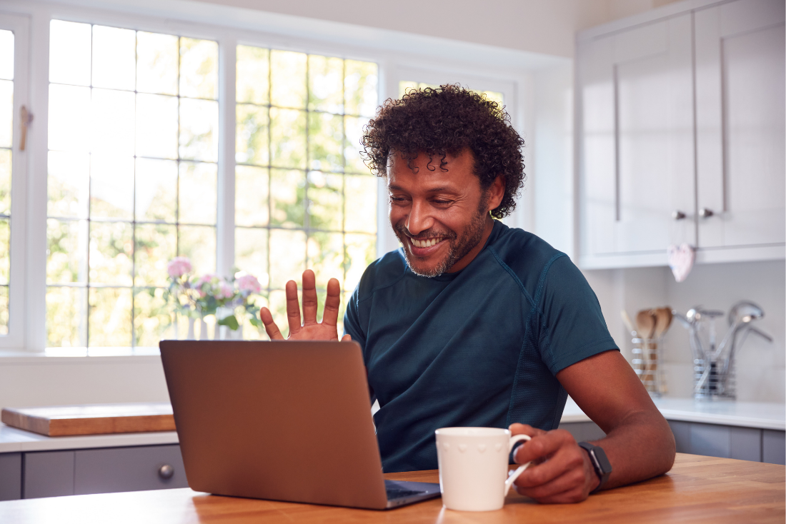 Man socialising on laptop